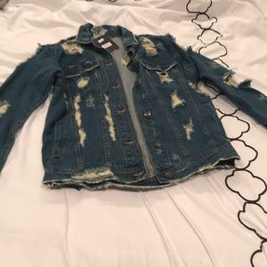 Distressed jean jacket